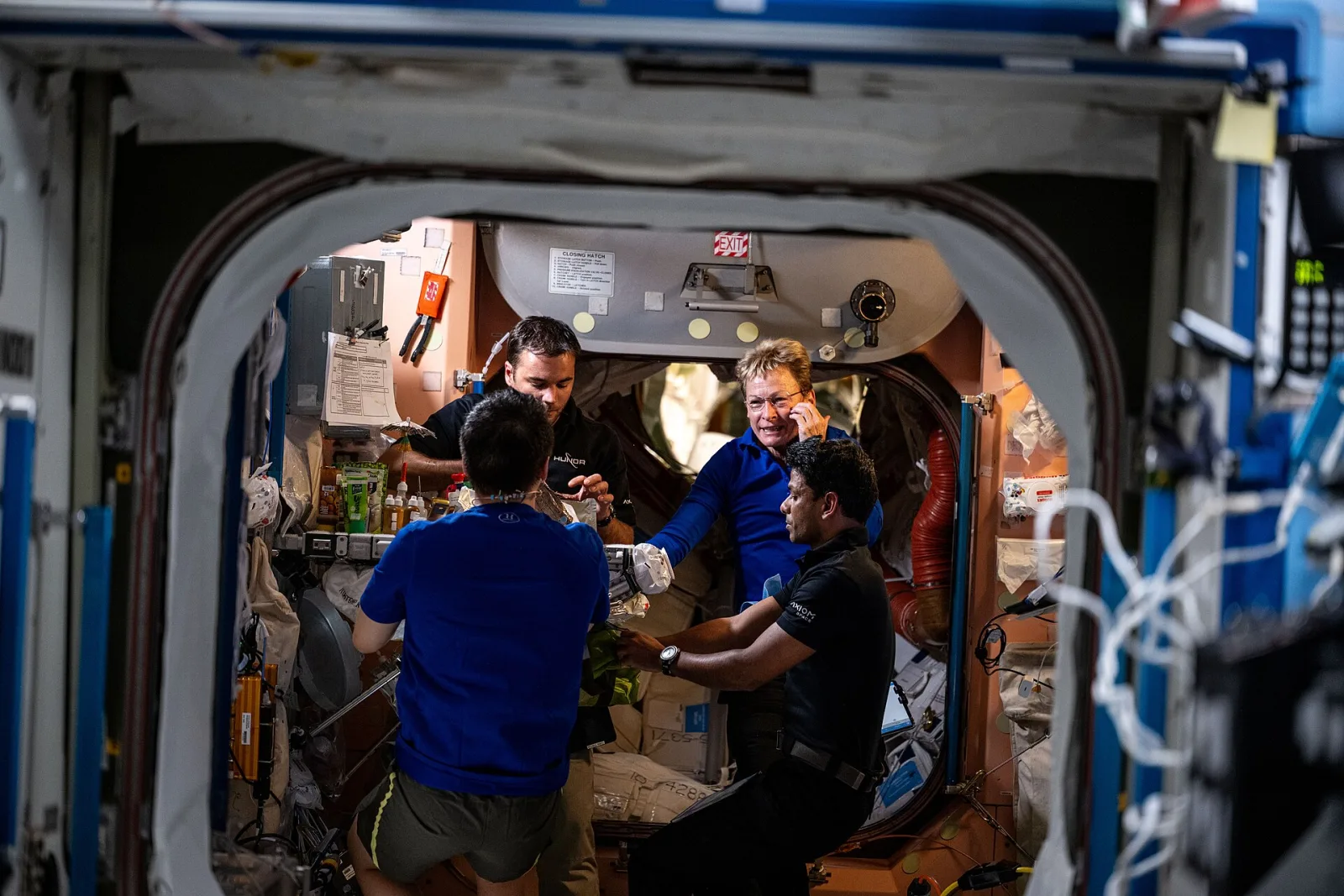 NASA astronaut Jonny Kim joins Axiom Mission 4 crew members for lunch (iss073e0252473)